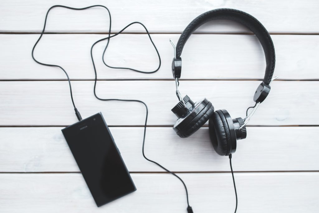 Phone and headphones image via Pexels