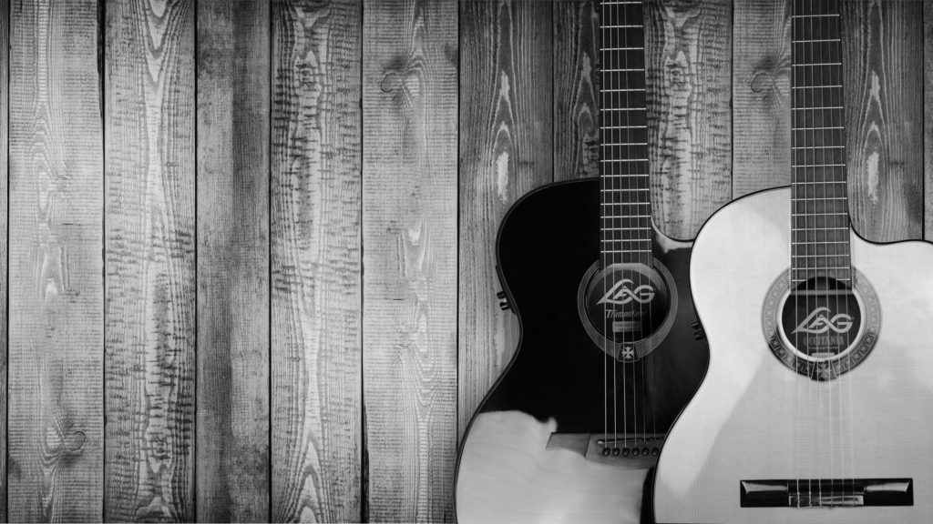 Black and white image of two guitars