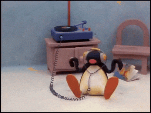 Pingu listening to a vinyl GIF
