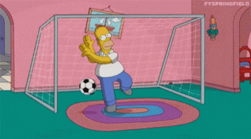 Simpsons GIF of Homer being overwhelmed by footballs while trying to defend a goal