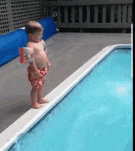 Toddler falling into pool GIF