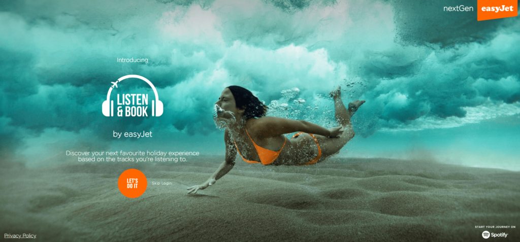 A girl swimming underwater touching the sand with bubbles coming from her mouth surrounding her. It says "Listen & Book" with headphones over the writing.