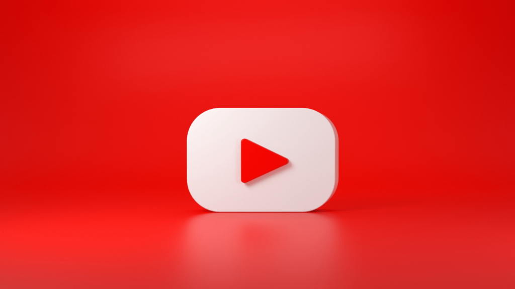 Red background with YouTube play button in the foreground