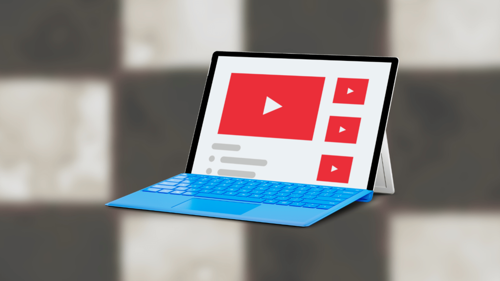 Chequerboard blurred background. In the foreground is a graphic image of YouTube on a tablet