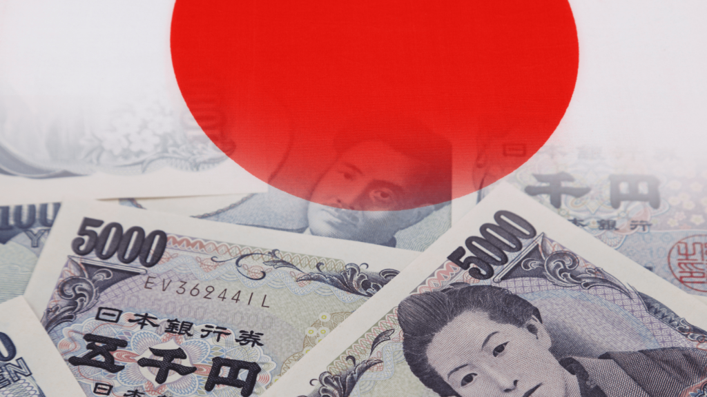 Japanese flag faded with yen underneath. 