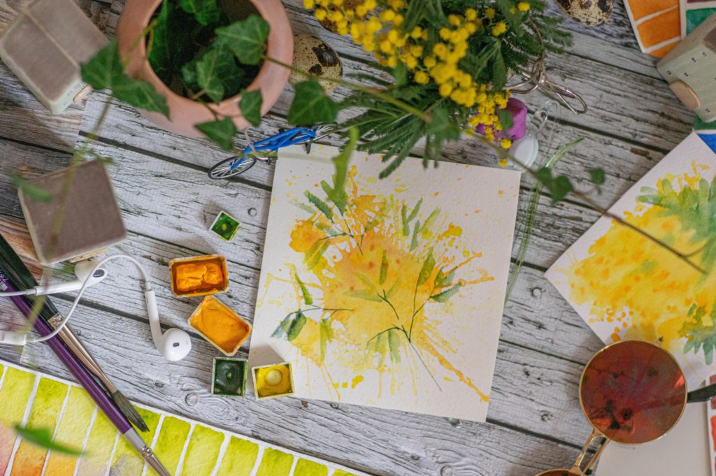 5 creative hobbies to try in the new year - be kinder to your mind. Photo of painting with flowers.