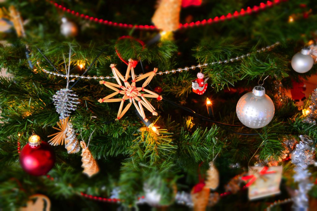 3 content ideas for YouTubers this Christmas. Photo of a Christmas tree up close.