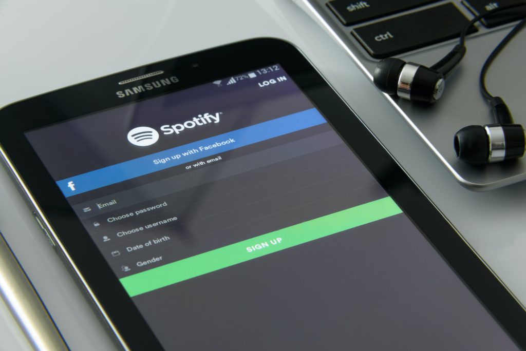 Spotify has reached 236 million Premium subscribers. Photo of a tablet with Spotify loaded onto the Settings page.