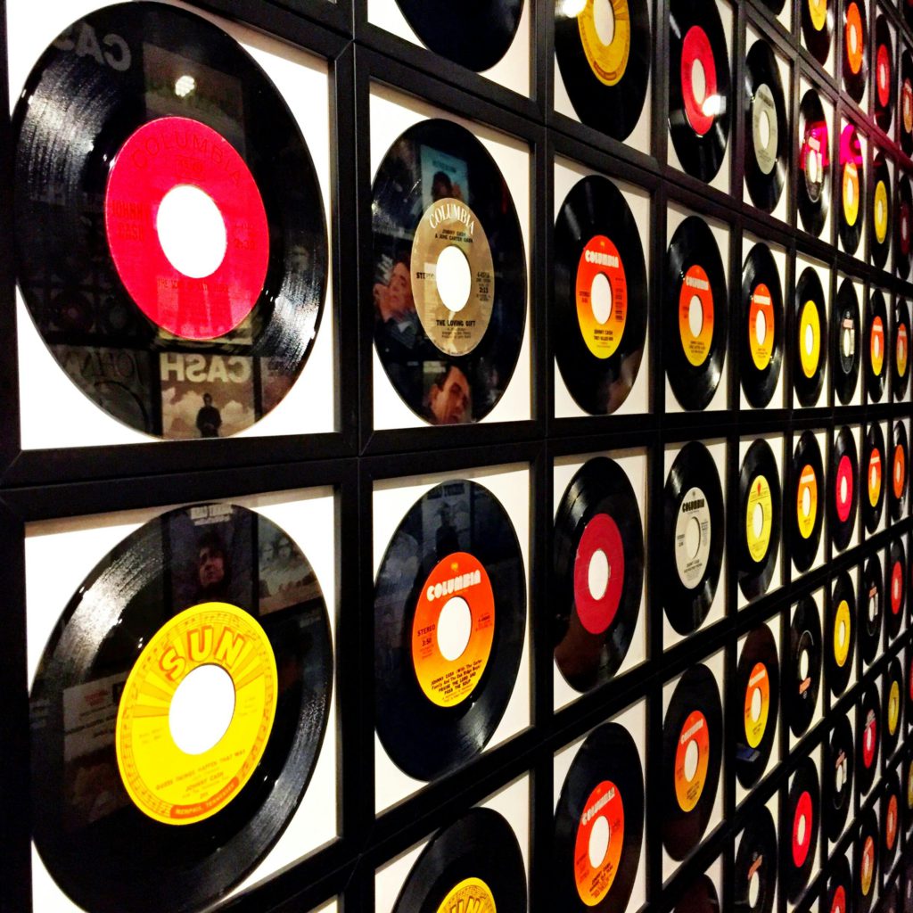 How to get signed as a music artist - a simple guide. Wall of records.