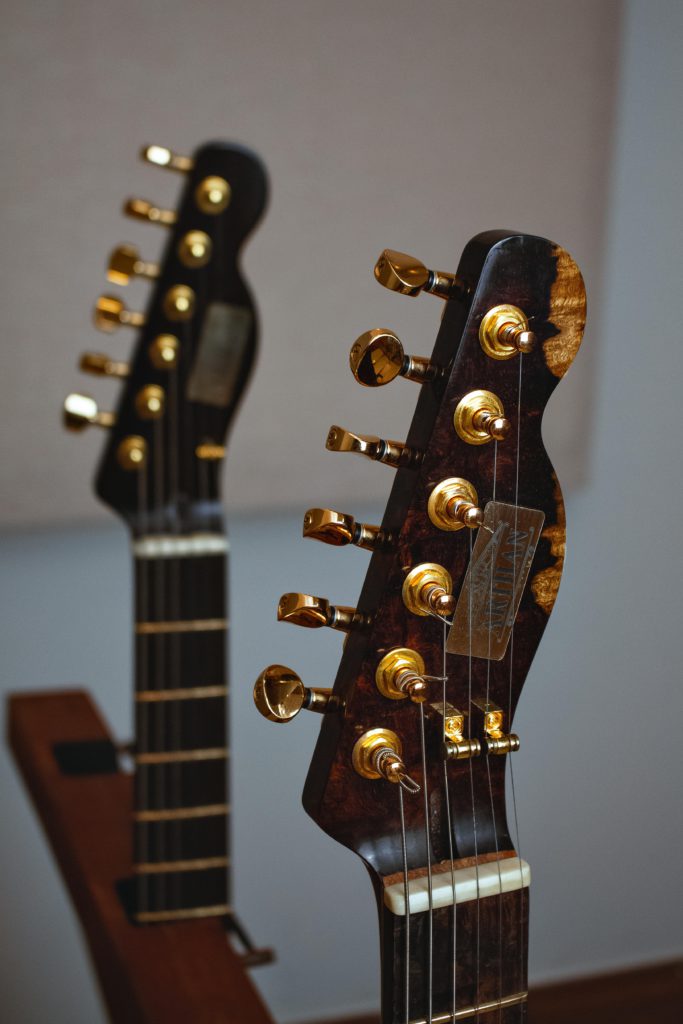 What are exclusive samples within the music industry? Photo of up close of guitar handle.
