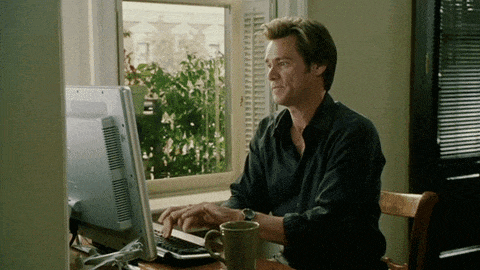 Improve your email outreach with free tool - Mail Grader. Jim Carrey typing extremely fast GIF.