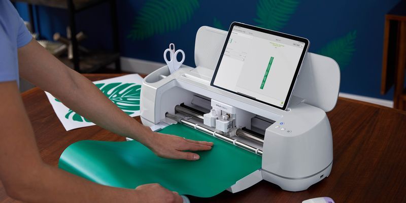 Getting started with cricut - a beginner's guide to crafting magic. Photo of a cricut machine.