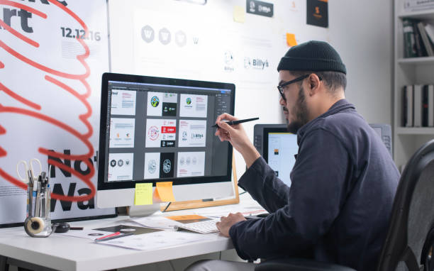 What it means to be a creator. Photo of a man at a desk creating content.