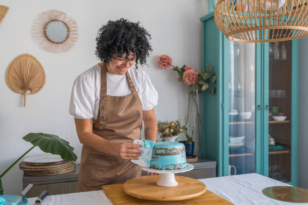 Turning a hobby into a business - a simple guide. Photo of a woman icing a cake.