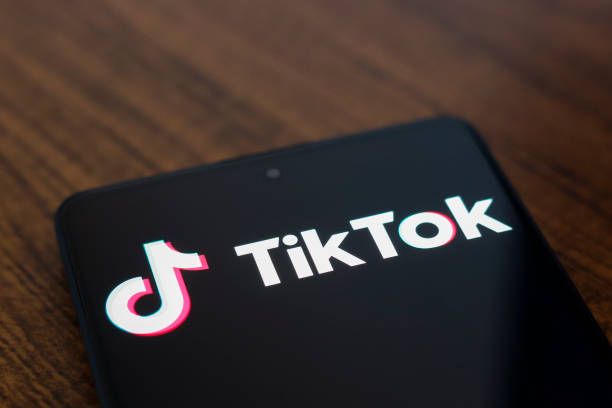 Music.ly's transformation into TikTok - a digital revolution. Photo of a tablet on a desk, displaying TikTok.