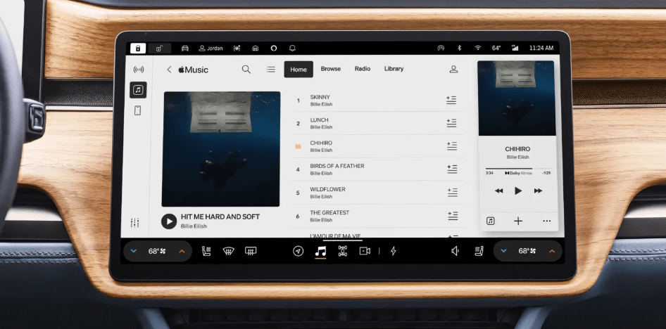 Electric car company Rivian have partnered with Apple Music. Photo of the Apple interface within a Rivian car.