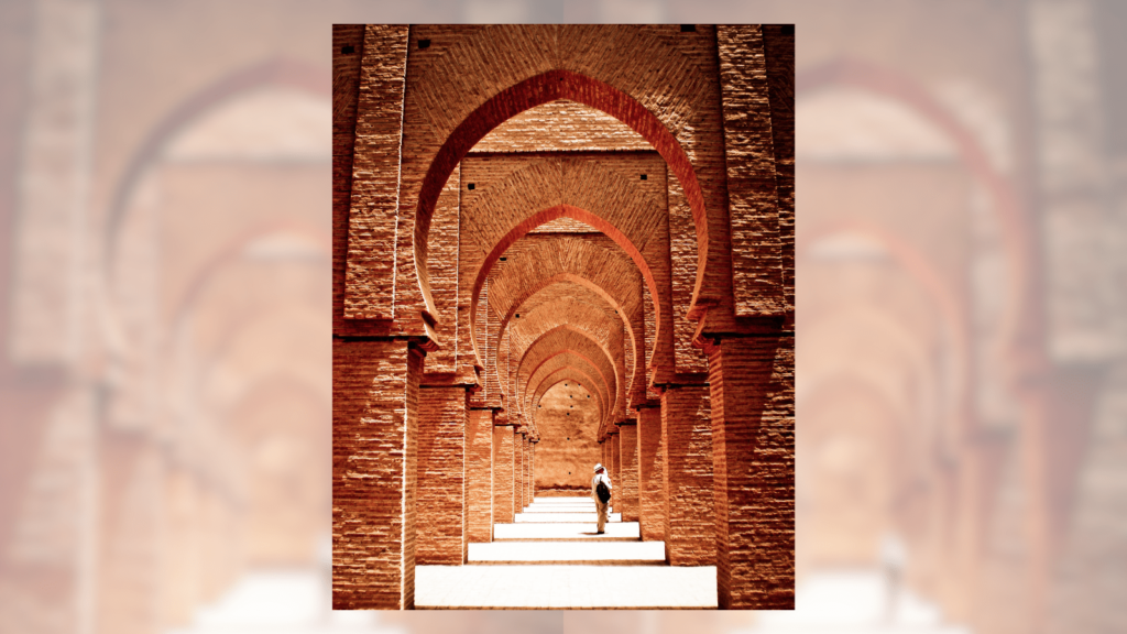 The rule of thirds and other composition techniques - elevating your photography. Photo of a person under arches.