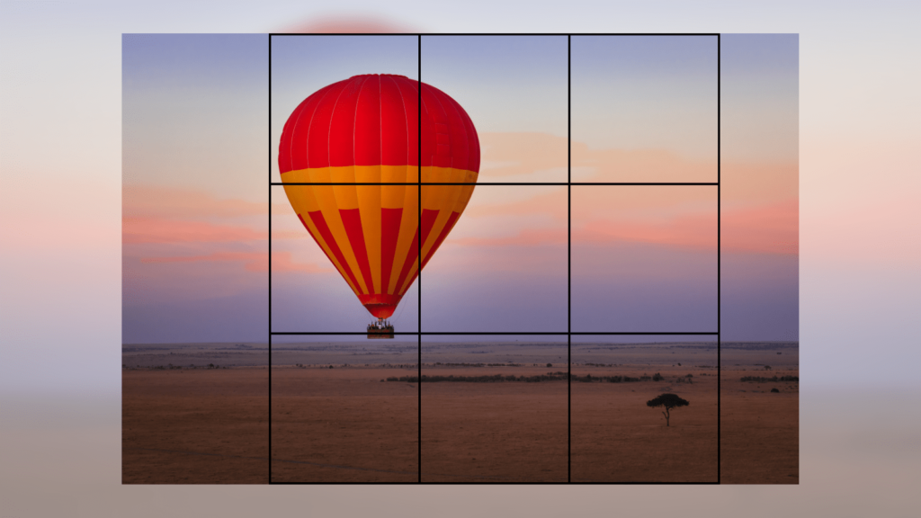 The rule of thirds and other composition techniques - elevating your photography. Photo of a hot air balloon in the desert with rule of thirds grid on top.