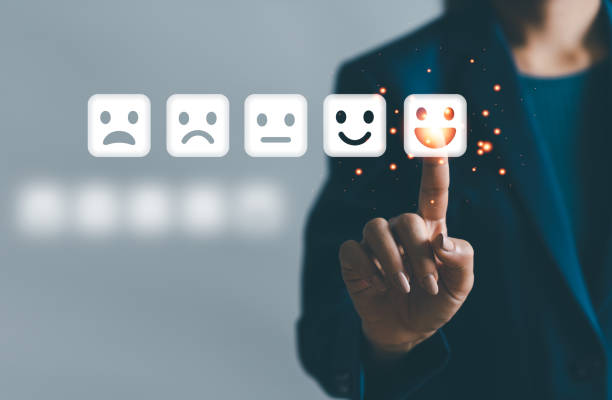 Client management - essential tips for building and maintaining strong client relationships. Photo of sad to happy faces, with a finger clicking on the happy one.