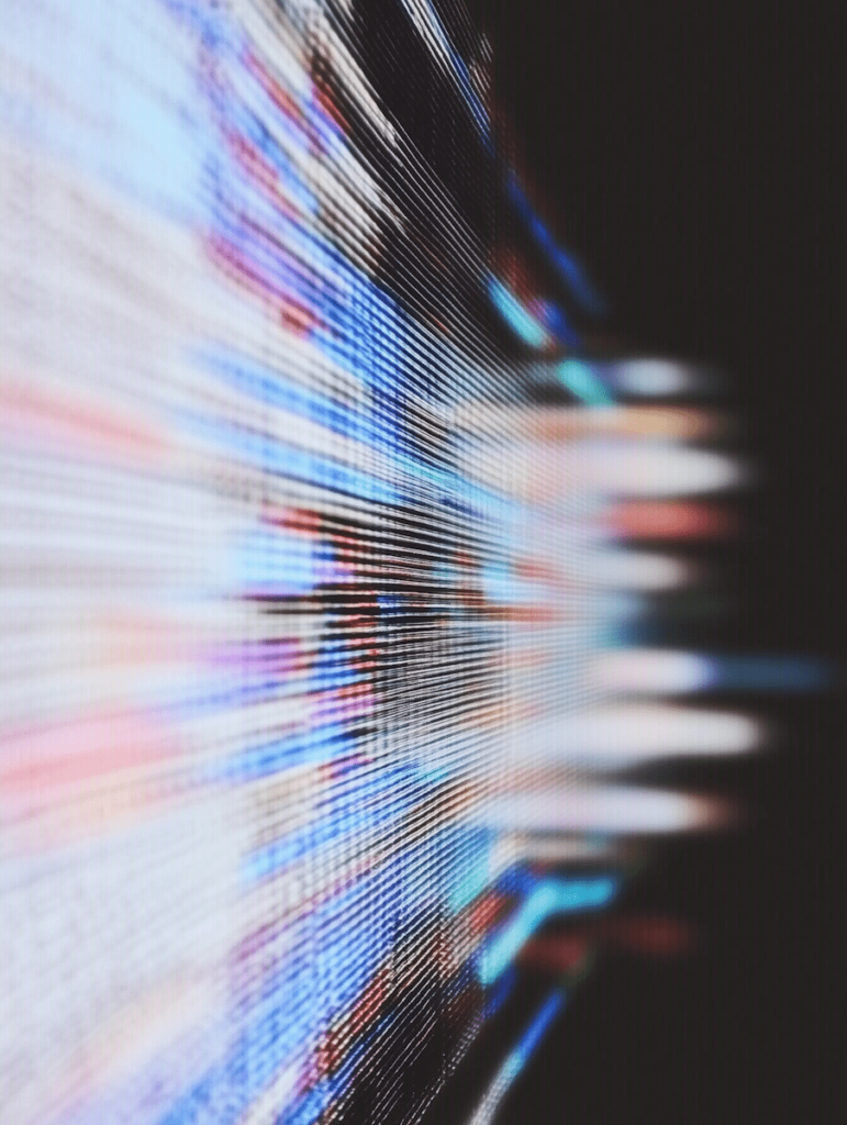 Clearing the cache: what it does—and when you should do it. Photo of lights on a screen, blurred.