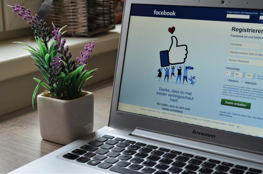 Social media privacy settings you should check immediately. Photo of Facebook on a laptop.