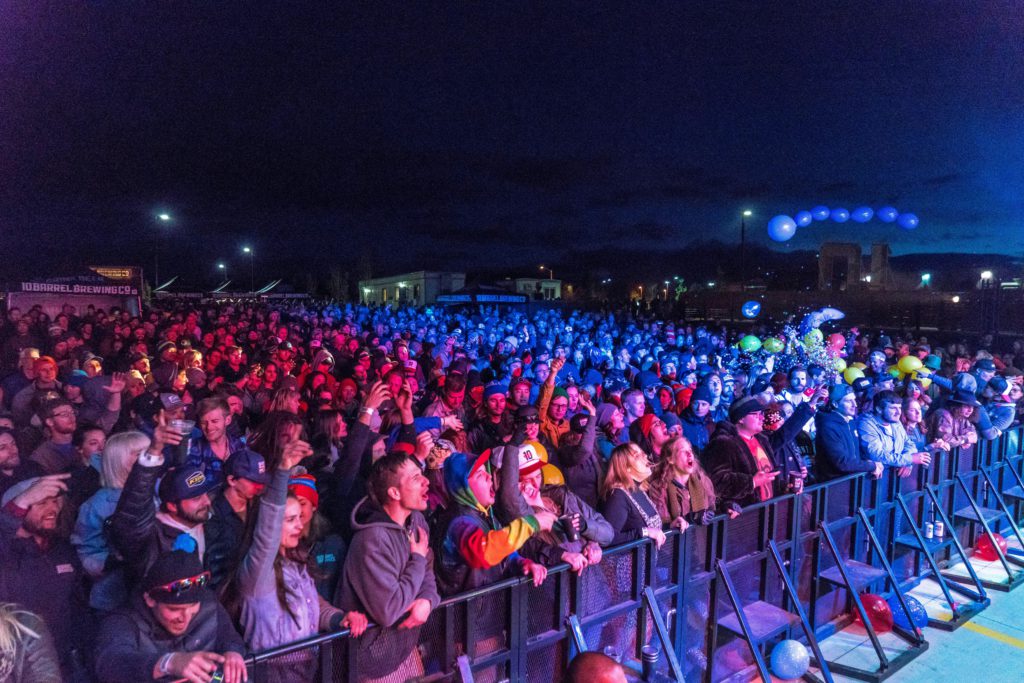 Fan engagement ideas you can steal and try today. Photo of fans at a concert.