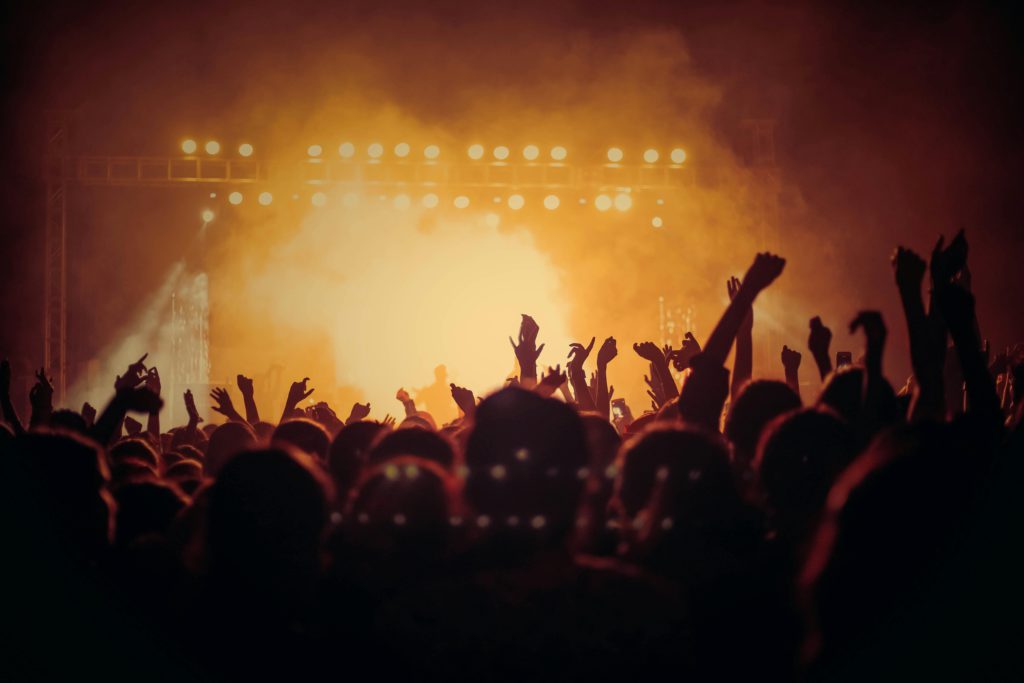 How to use social media to get booked for gigs, commissions, or collaborations. Photo of a gig.