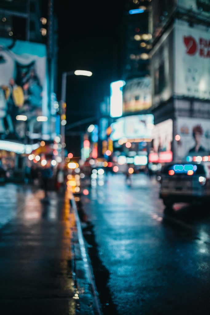 Why Instagram reduces photo resolution when you upload. Photo of a city that is blurry.