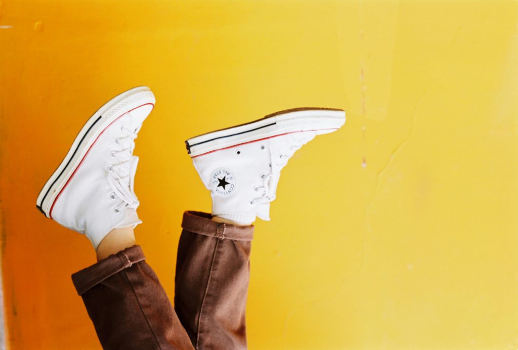 DIY branding: free tools to make your social media look professional. Photo of a pair of high top converse to show the brand.