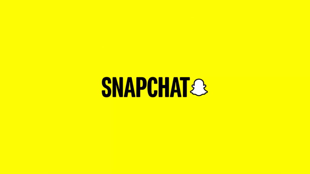 Snapchat lay off over 16% of its staff depsite growth in revenue. Snapchat logo.