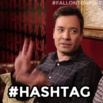 Hashtags explained: how many should you actually use? GIF of someone doing a hashtag with their hands.