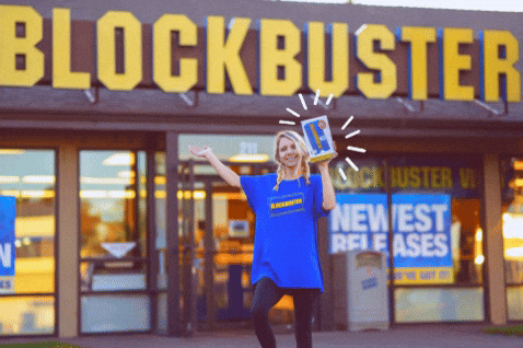 The rise of subscription entertainment. Photo of someone outside Blockbuster.