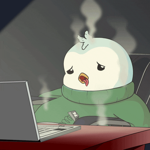 The 2-hour social media week: Batching content without burning out. Penguin looking burnt out looking at laptop GIF.